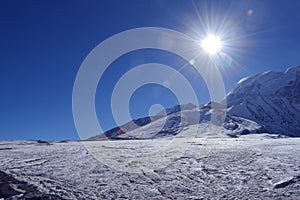 Beautiful snow covered Himalaya sunshine with blue sky sikkim,India