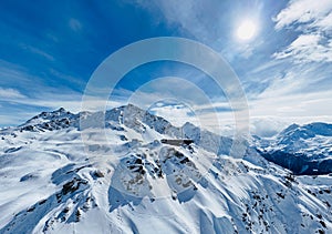 Beautiful snow-covered mountains in La Tzoumaz, Switzerland photo