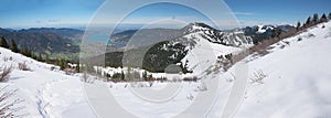 Beautiful snowy landscape at Setzberg mountain, view to tourist area Tegernsee