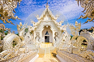 Beautiful snowy white temple Wat Rong Khun temple in Chiang Rai, Thailand, Asia photo