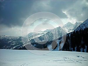 Beautiful snowy winter landscape in a mountain ski resort, panoramic view