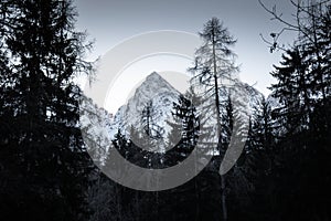 Beautiful snowy winter mountain range landscape in julian alps, slovenia