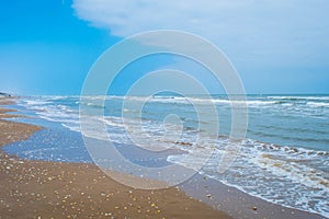 A beautiful soft and fine sandy beach along the gulf coast of South Padre Island, Texas