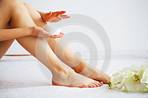 Beautiful Soft Skin. Closeup Of Long Woman Legs With Perfect Hairless Smooth And Silky Skin. Hair Removal, Beauty Body Care