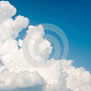 Beautiful soft white fleecy cloud on blue sky background. Square