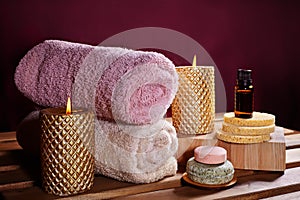 Beautiful Spa. Aroma Therapy with Herbal Oil, Natural Soap and Relaxation Candles. Wooden Color and Warming Towels