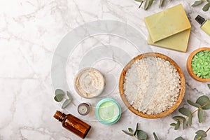 Beautiful spa composition on a wooden background with eucalyptus leaves