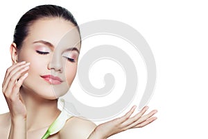 Beautiful spa woman with clear skin isolated on white background. Skincare and facial treatment concept