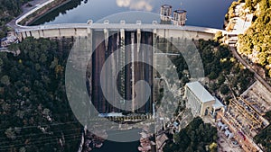 Dam of the Sau Reservoir in the Province of Girona, Catalonia, Spain. Amazing aerial view in a sunny day photo