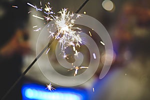 Beautiful sparker with bokeh: 'Happy new year!' concept