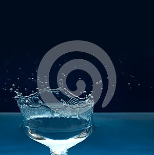 Beautiful splash of blue freshnes water photo