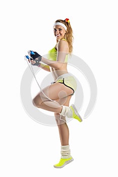 Beautiful sportsgirl with skipping rope