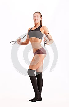 Beautiful sportsgirl with skipping rope