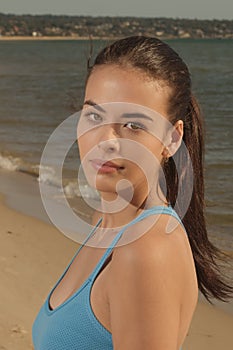 Beautiful sportswoman on beach