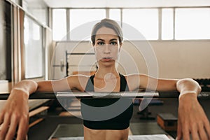 Beautiful sporty woman in old school gym