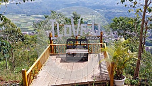 A beautiful spot and a chair that says I Love U on Nirwana Hill