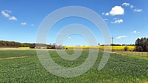 Beautiful spring landscape of fields and meadows in the Polish countryside