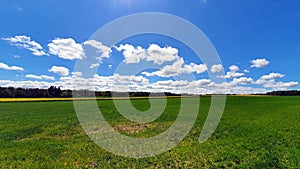 Beautiful spring landscape of fields and meadows in the Polish countryside