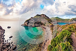 Beautiful spring scene of Pirates Bay, Porto Timoni, Afionas village location. Perfect morning seascape of Ionian Sea. Fantastic o