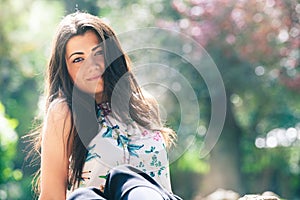 Beautiful spring young woman outdoors. Glowing female beauty.