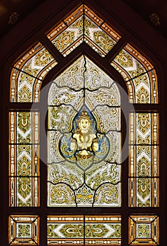 Beautiful stained glass window in temple of the Golden Buddha or Wat Traimit