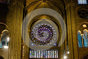 Beautiful stained glass windows in the  Notre Dame  in Paris, France