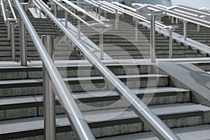 Beautiful stainless steel handrails are installed on the walls and steps.