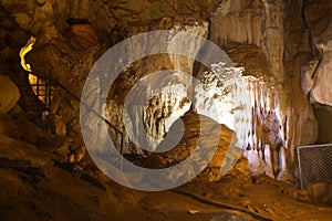 Beautiful stalagmites and stalactite inside the Wat Tham Suwan Khuha or Golden cave.