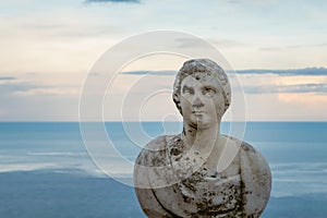 Beautiful statue from the belvedere, the so-called Terrazza dell`infinito, The Terrace of Infinity seen on the sunset, Villa Cimbr photo