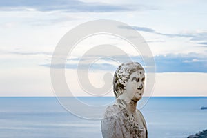 Beautiful statue from the belvedere, the so-called Terrazza dell`infinito, The Terrace of Infinity seen on the sunset, Villa Cimbr photo