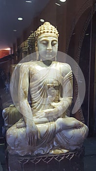 Beautiful statue of Buddha in the gardens of the Nan Tien. Temple, Unanderra, close to Wollongong, NSW, Australia