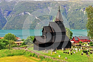 Beautiful stave church on fjords at Ornes