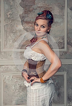 Beautiful steampunk woman with pink hair