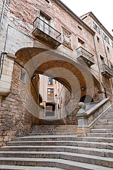 Beautiful steps and archway of the Pujada de Sant Domenec located in the Jewish Quarter of Girona, Spain photo