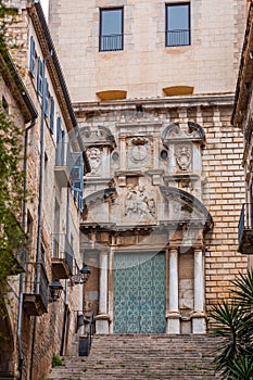 Beautiful steps and archway of the Pujada de Sant Domenec located in the Jewish Quarter of Girona, Spain photo