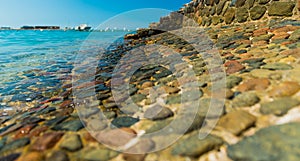 Beautiful stone beach coasline background photo