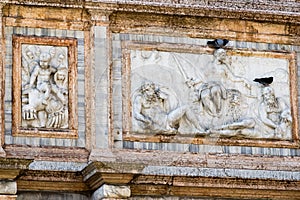 Beautiful stone carvings & decorations adorning a wall of St. Mark`s Basilica in Venice
