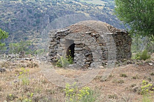 Beautiful stone house dedicated to the refuge of livestock photo