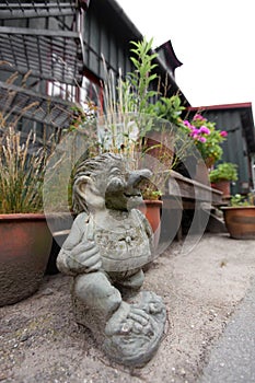 A beautiful stone statuette of a troll figure in Copenhagen, Christiania photo