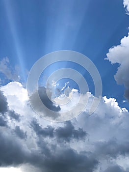Beautiful storm clouds. Impressive sky with sun rays.