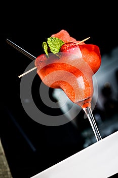 Beautiful strawberry cocktail or ice cream on bar counter. Close up