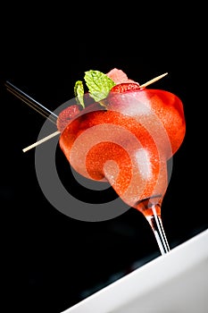 Beautiful strawberry cocktail or ice cream on bar counter. Close up