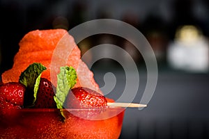 Beautiful strawberry cocktail or ice cream on bar counter. Close up