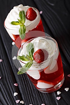 Beautiful strawberry cocktail with whipped cream and mint, decor