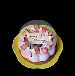 Beautiful strawberry vanilla mousse cake with edible white chocolate greeting card