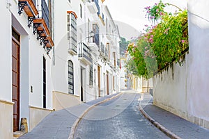 Beautiful Street in Estepa, province of Seville. Charming white village in Andalusia. Southern Spain. photo