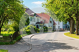 Beautiful street with modern residential houses in summer sunny