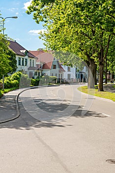 Beautiful street with modern residential houses in summer sunny