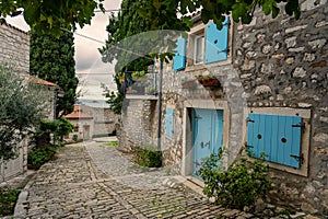 beautiful street of Rovinj Croatia with cobblestone and colorful shutters