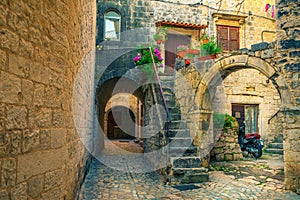 Beautiful street view with rustic houses in Trogir, Dalmatia, Croatia